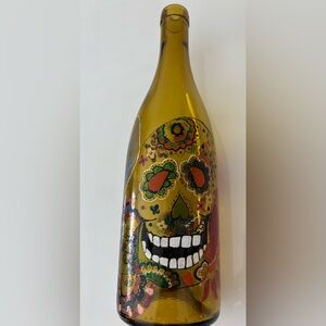 NWT Hand painted recycled empty wine bottle with sugar skull and flowers.